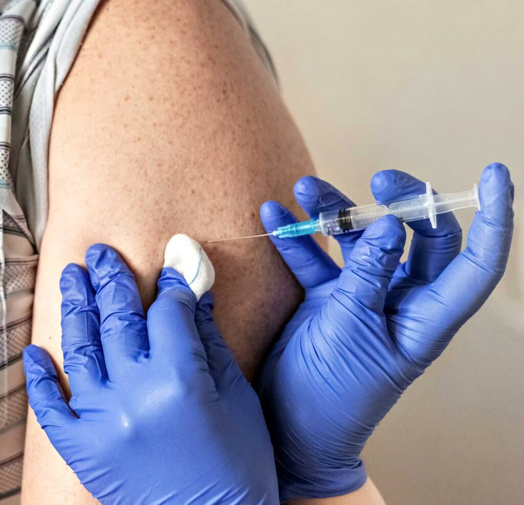 a doctor vaccinates a man against coronavirus at a 2025 03 10 10 44 24 utc